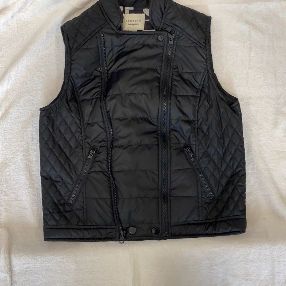 Black nylon vest with multi functional zippers